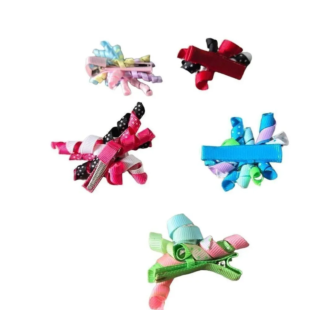 5 infant twirly bows, 2